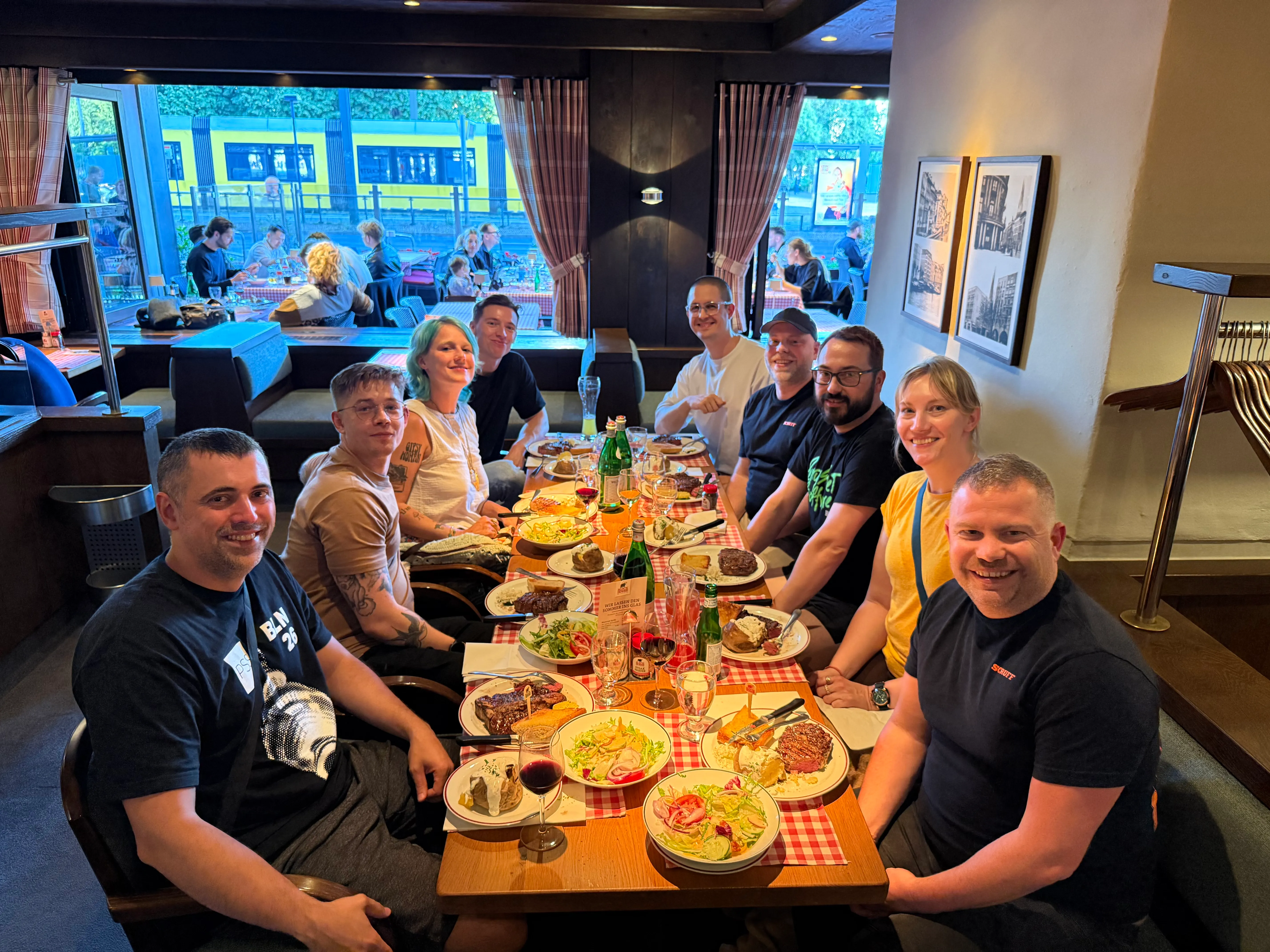 Perry Street Software team members sharing a meal indoors