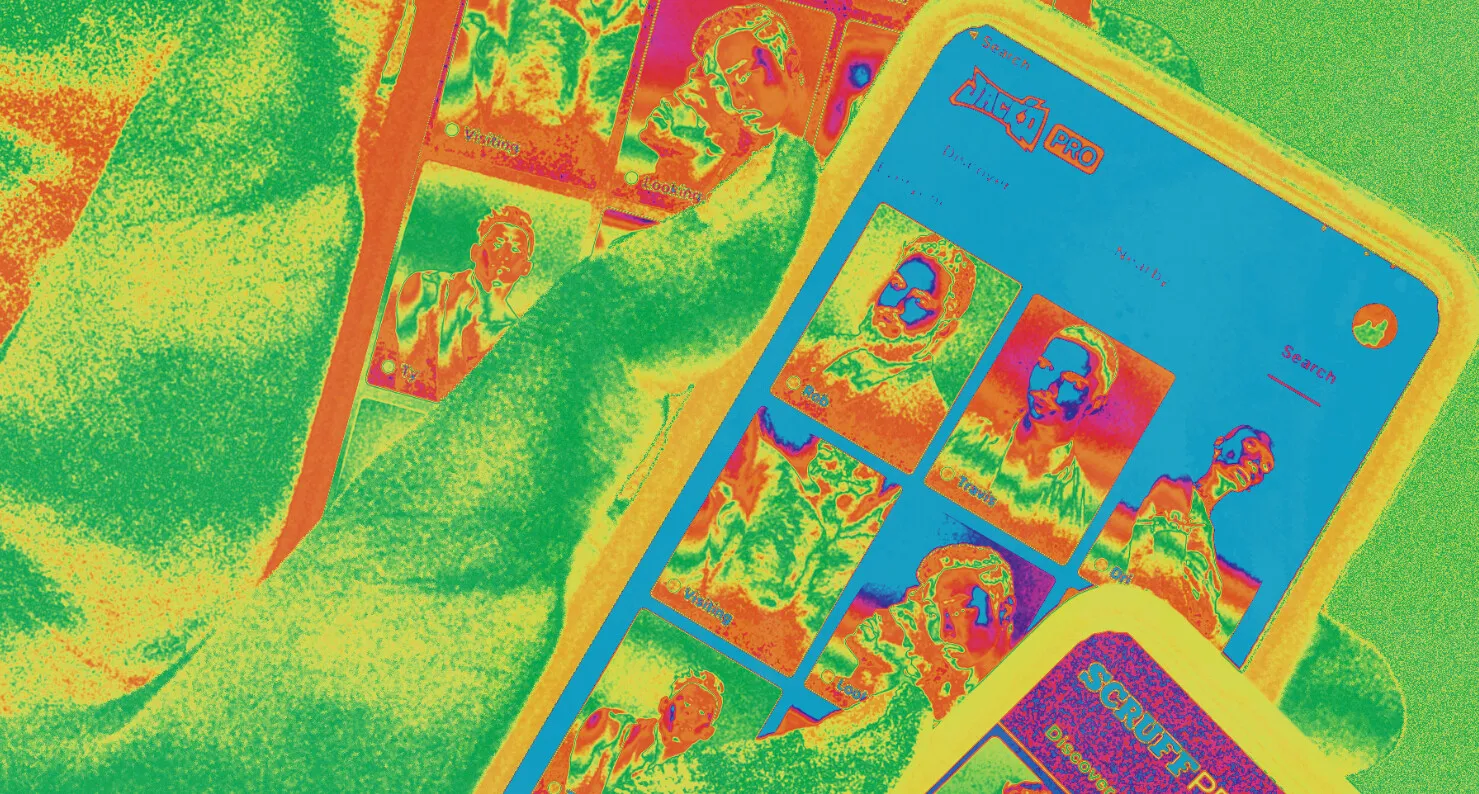 Thermal-imaging view of a hand holding phones running the Jack’d app